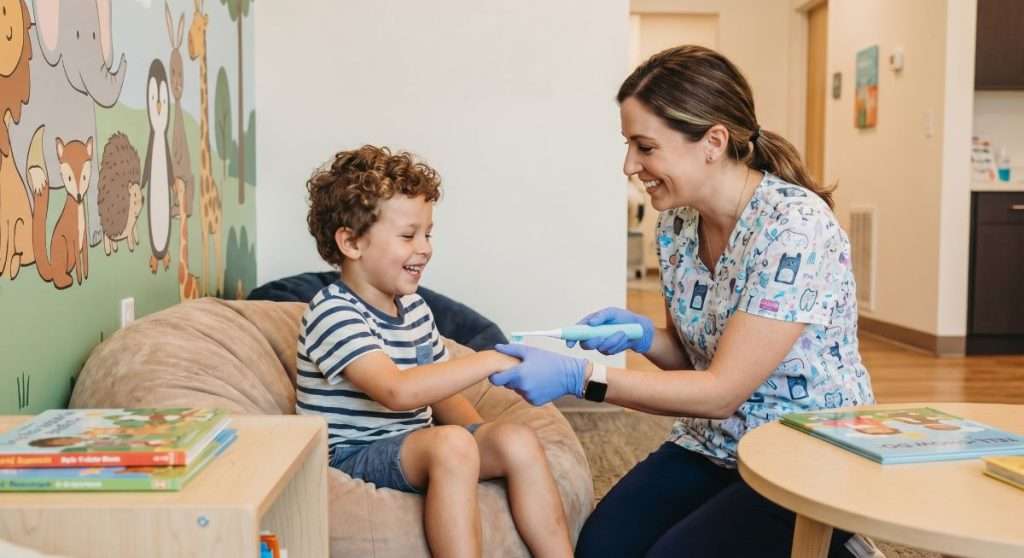 Family dentistry in Mississauga with a pediatric dentist using the Tell-Show-Do method to ease anxiety for a young patient.