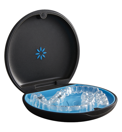 Invisalign aligners in their case, showcasing both upper and lower teeth